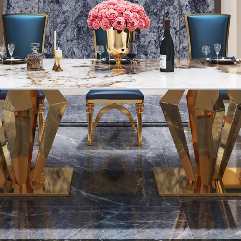 Une table à manger en marbre en acier inoxydable pour une décoration haut de gamme
